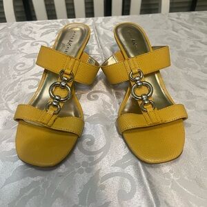 New yellow Anne Klein slip on shoes size 8 1/2 medium with 2 3/4 inch heel.